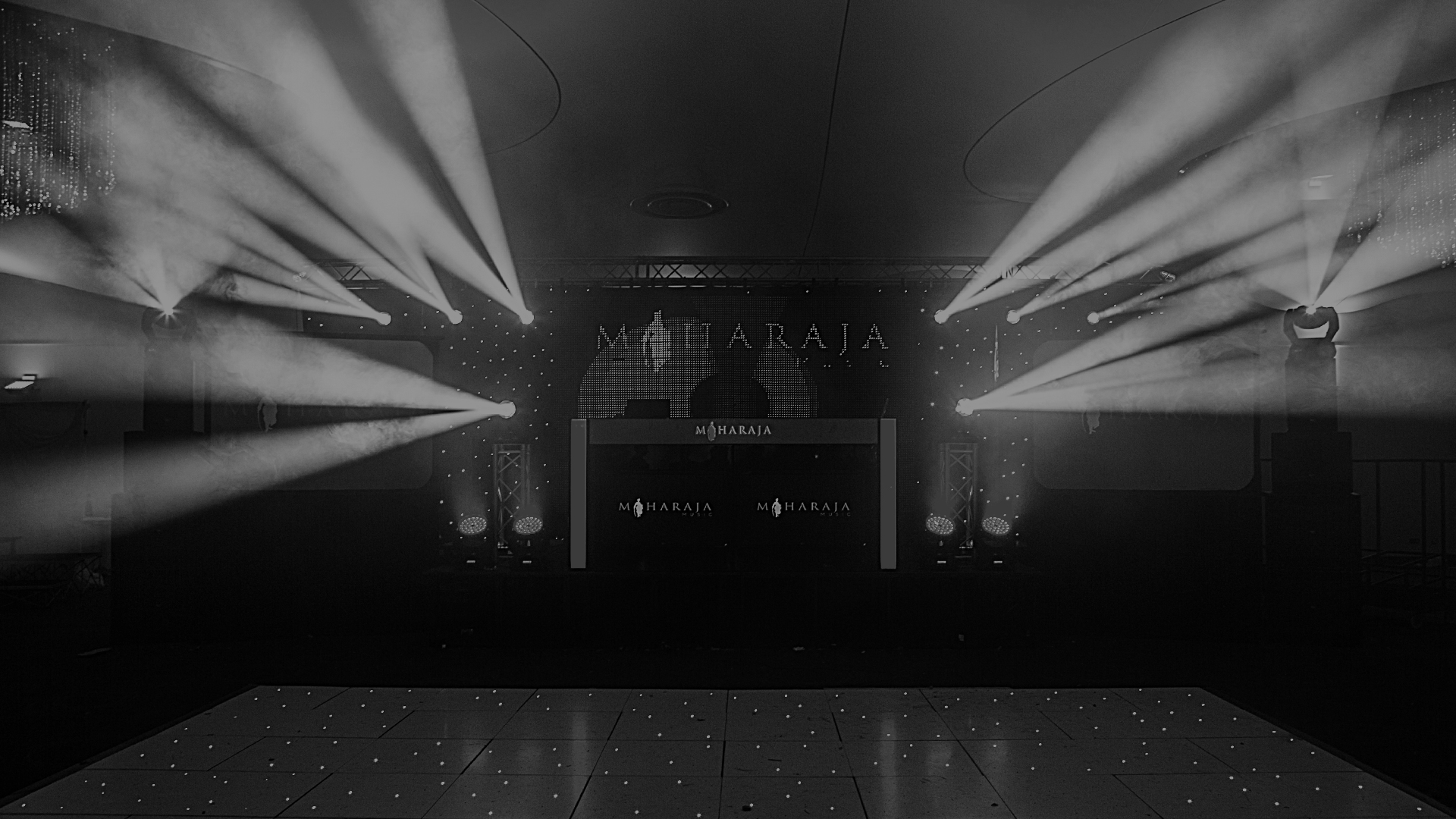 Maharaja Music stage setup with DJ booth and lighting